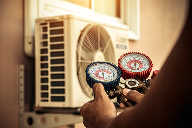 Professional Ac Installation technician working in Camden, AL